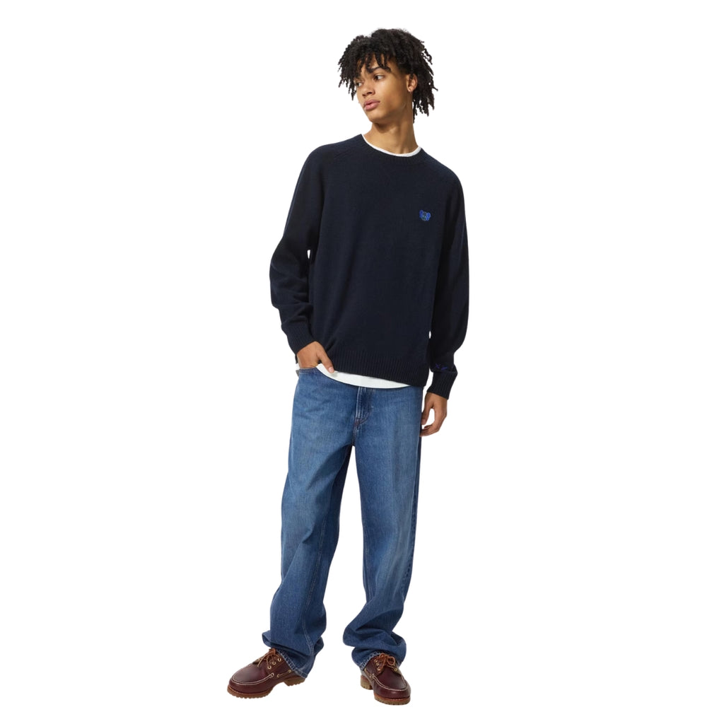 Suéter Uniqlo de Gola redonda x Kaws